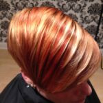 A woman with golden hair with streaks